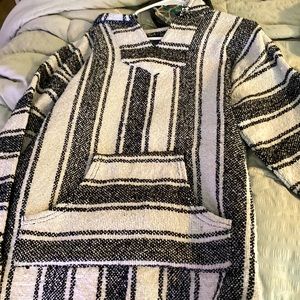 White and black sweater